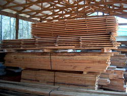Red oak boards stick stacked for air-drying.