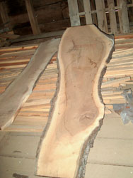 Wide plank board cut from logs with character.